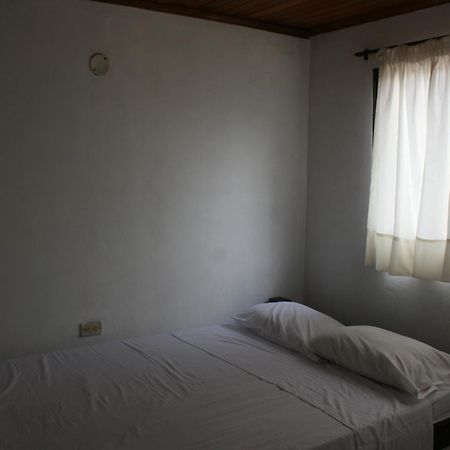Vivienda Turistica El Castillo Бурітака Номер фото